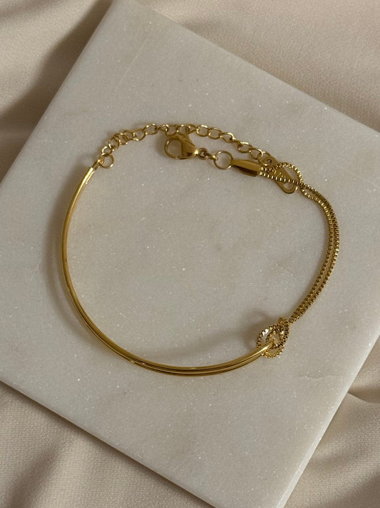 Amani · Doppelketten-Armband mit filigranem Knoten · 18k vergoldet