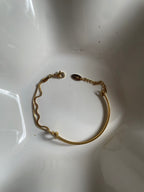 Amani · Double chain bracelet with filigree knot · 18k gold plated